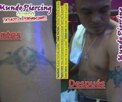 Tapando un tatuaje mal hecho con otro tribal azul/negro