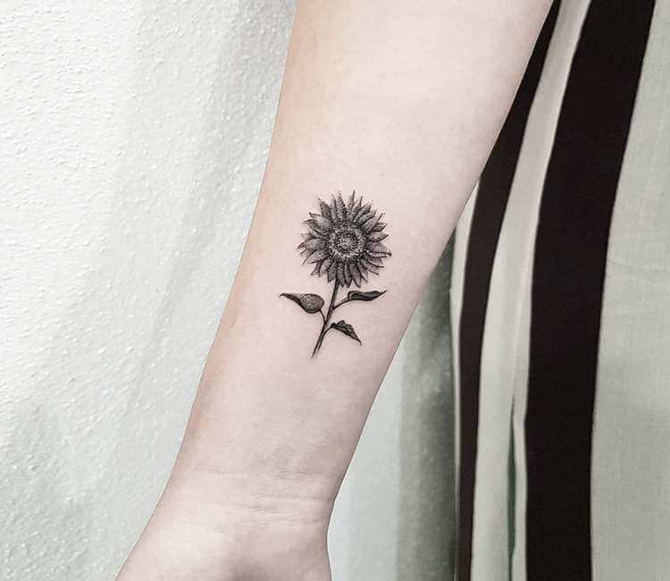 Black and Grey color sunflower tattoo on ARM