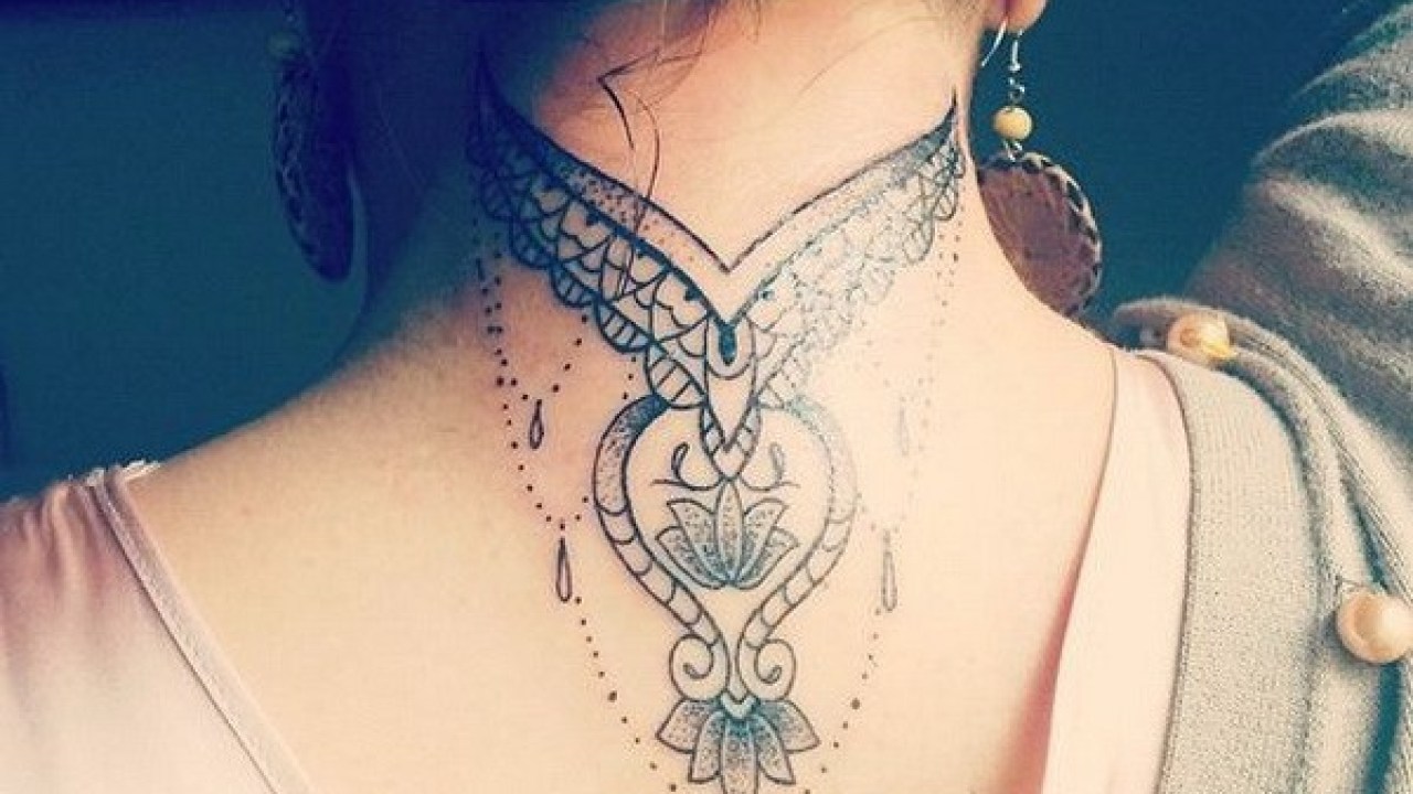 Tattoo on the lady's neck