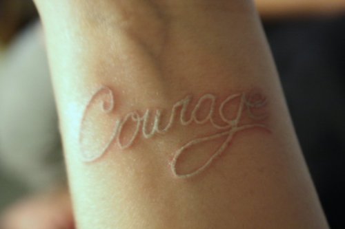 Letter of your favorite language on the upper arm
