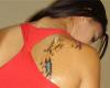 Tres borboletas tatuadas
