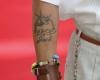 Tatuaje de Johnny Depp golondrina mar y sol