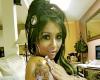 Snooki Shows off her new crown tattoo