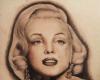 black and gray Marilyn Monroe tattoo