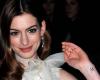 First tattoo of Anne Hathaway is on her wrist showing Alphabetic M