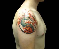Logo de Mortal Kombat Dragon Tribal en Llamas