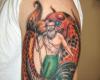 Arm Pisces tattoo