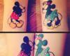 Vintage Mickey Mouse and Minnie Mouse in kiss at the wrist