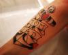 Mom and dad anchor tattoo