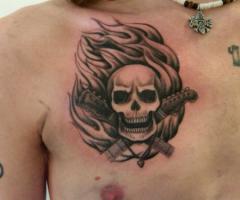 Calavera en llamas con guitarras