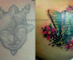 Tatuaje de mariposa cover up