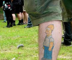 Homer Simpson tattoo on foot
