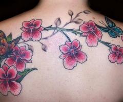 Butterfly and orchid tattoo