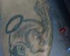 Tatuaje de calavera con corona de angel