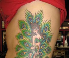 20 Beautiful Ideas of Peacock Feather Tattoo Designs