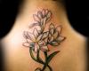 http://www.tattooset.com/images/tattoo/2012/03/29/1538-flower-feminine-tattoo_tiny.jpg