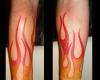 Tatuaje de llamas en el brazo