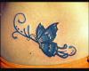Tatuaje mariposa en azules