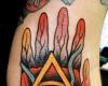 Tatuaje mano con ojo