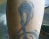 Tatuaje de clave de sol de agua