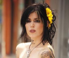 Kat Von D sleeve tattoo on left arm
