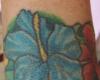 Hawaiian flower armband tattoo