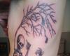 Skeleton and tree tattoo
