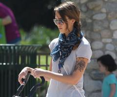 Jessica Alba rose tattoo on her left arm