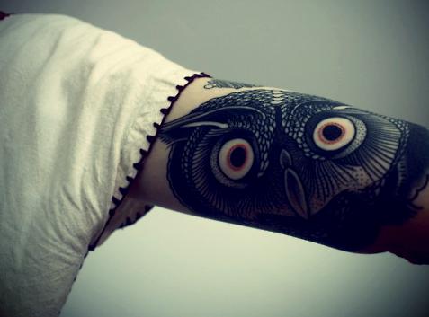 Owl with red eyes