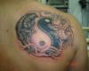 Dragon and Tiger Ying Yang tattoo