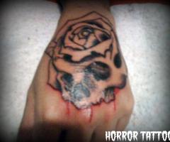 Skull and rose