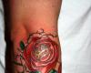 Rose and diamond tattoo