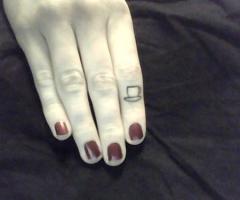 Coffee cup tattoo on finger