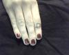 Coffee cup tattoo on finger