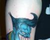 Joker cartoon tattoo
