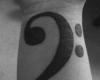 Bass clef tattoo