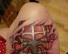 Tatuaje de Spiderman en la pierna