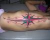 Tatuagem de Estrela Náutica na costela
