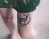 Deer and vegan tattoo on leg