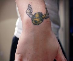 The Golden Snitch tattoo