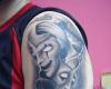 Theatre masks tattoo