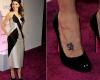 Marisa Tomei olho de Hórus tatuado no pé direito