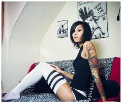 Photo of model with tattoos design