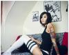 Photo of model with tattoos design