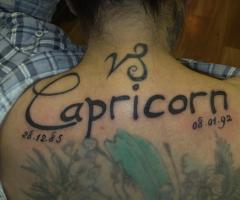 Capricorn back tattoo