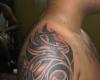 http://www.tattooset.com/images/tattoo/2012/06/05/4186-tribal-hombro-y-brazo-masculino_tiny.jpg
