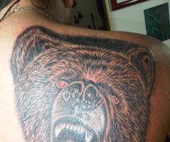 Bear back tattoo