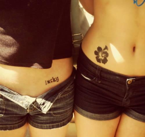 Lucky tattoo and hawaiian flower