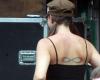 Infinity woman tattoo