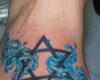 http://www.tattooset.com/images/tattoo/2012/06/12/4522-jewish-aquarian-star-of-david-tattoo_tiny.jpg